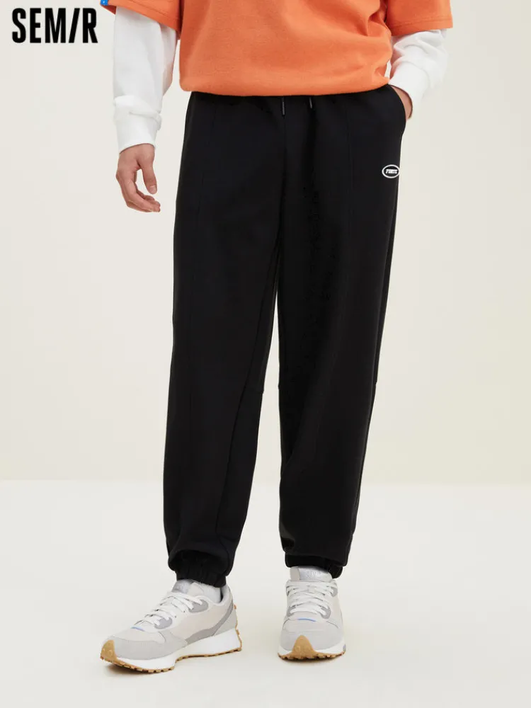 mens_ut_interlock_d_badge_0-1.webp SEMIR Men's UT Interlock 3D Badge Loose Knitted Jogging Pants