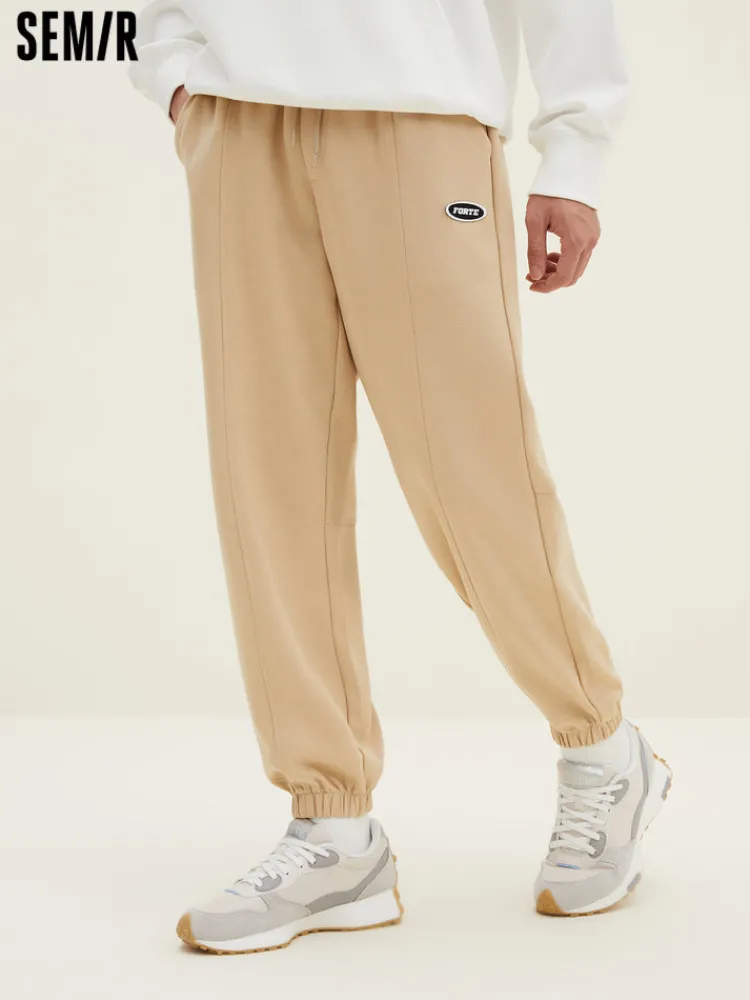 mens_ut_interlock_d_badge_0-2.webp SEMIR Men's UT Interlock 3D Badge Loose Knitted Jogging Pants