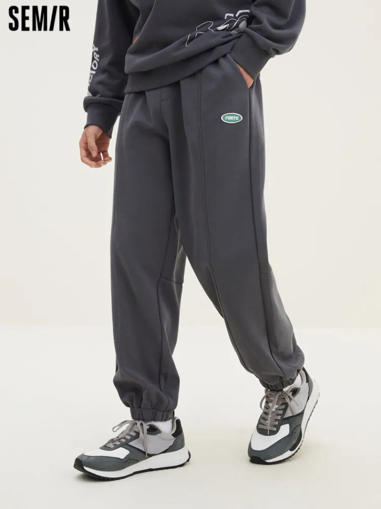 mens_ut_interlock_d_badge_0-3.webp SEMIR Men's UT Interlock 3D Badge Loose Knitted Jogging Pants