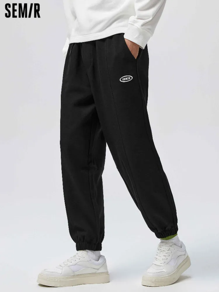 mens_ut_interlock_d_badge_0-4.webp SEMIR Men's UT Interlock 3D Badge Loose Knitted Jogging Pants